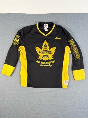 Roots Black and Yellow 'Canadian Gold Medal Champions' Hockey Jersey